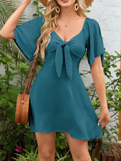 Breezy Charm Smocked Flutter Dress