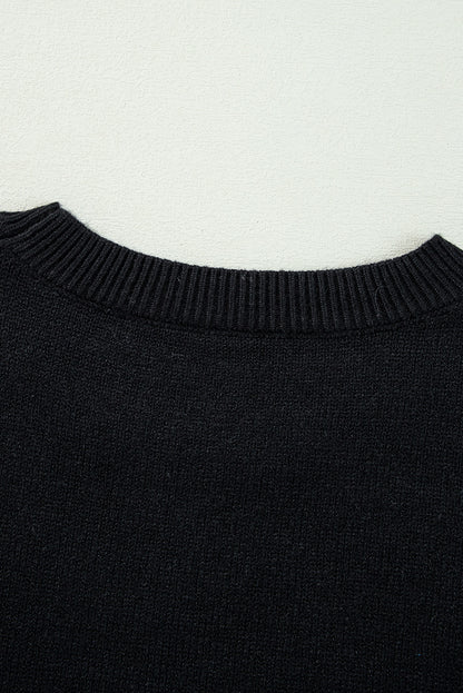 Cozy black "Boo" knitted sweater with ribbed edges for casual style