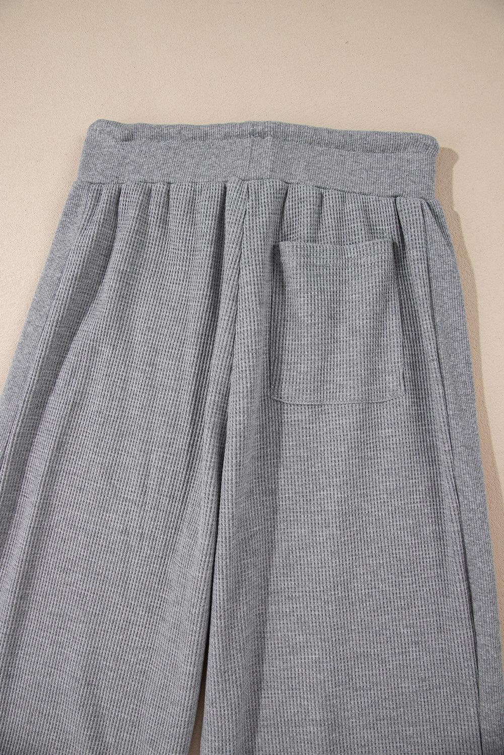 Cozy gray high-waist wide-leg pants with drawstring detail