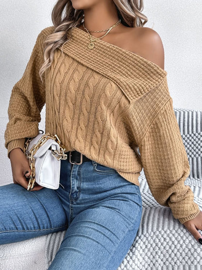 Asymmetrical cable-knit long sleeve sweater