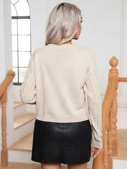 Cable-Knit Round Neck Long Sleeve Sweater.