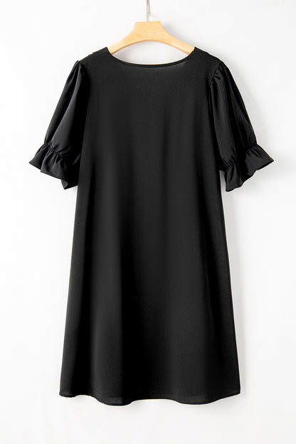 Elegant black ruffled mini dress with puff sleeves for plus sizes