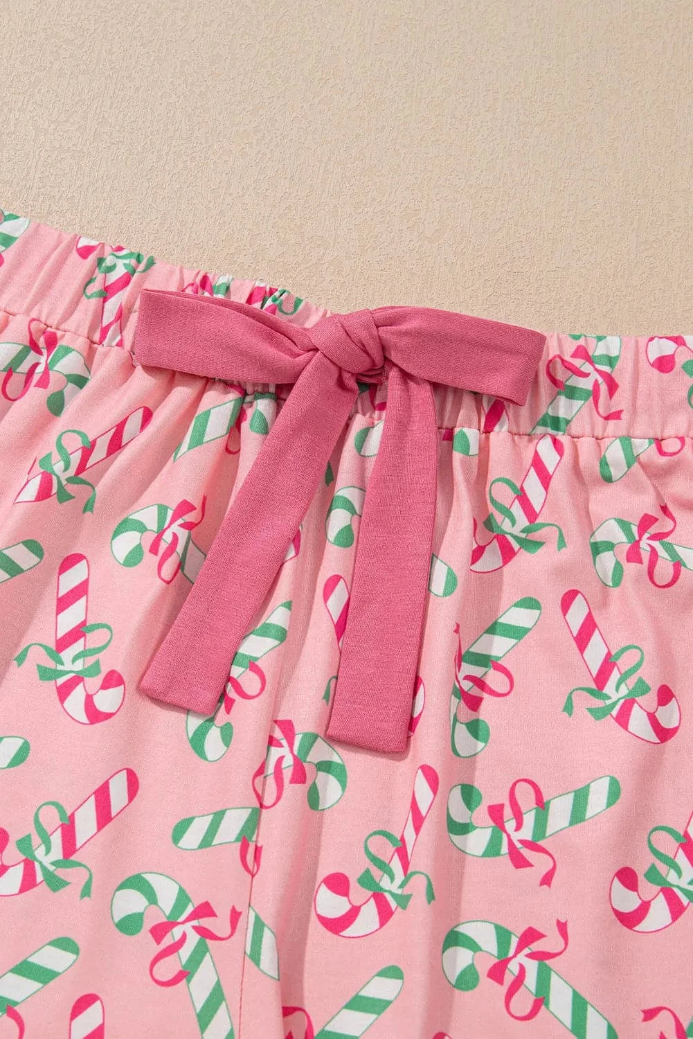 Candy Cane Collared Neck Top and Shorts Lounge SetFeatures: Basic style
Number of pieces: Two-piece
Sheer: Opaque
Stretch: Slightly stretchy
Material composition: 95% polyester, 5% elastane
Care instructions: MachinLove Salve Candy Cane Collared Neck TopLoungewear Sets