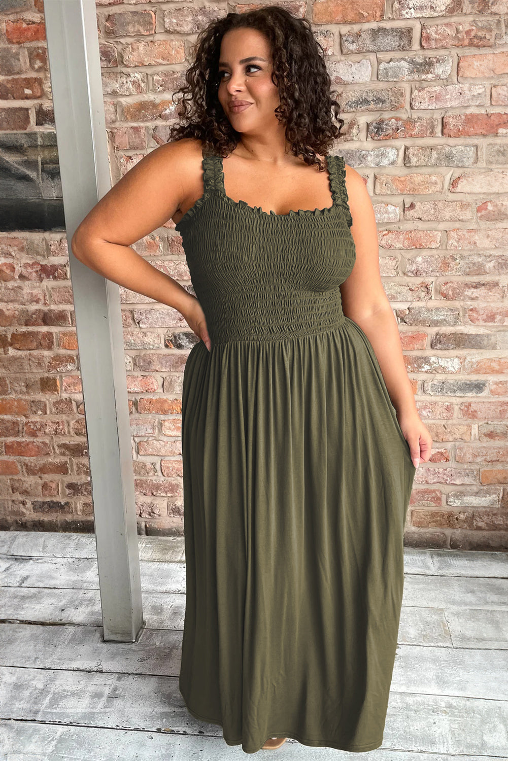 Flattering jungle green sleeveless plus size maxi dress with shirred bust