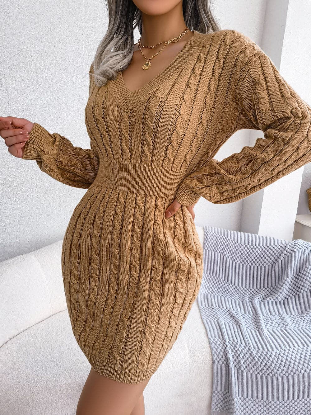 Cable-Knit V-Neck Mini Sweater Dress.