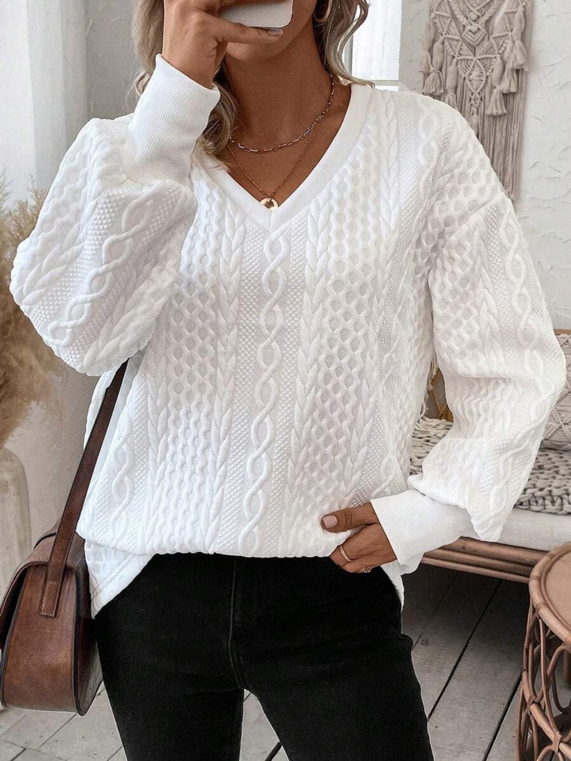 Casual V-neck long sleeve top in white, stylish and comfortable for everyday wear.