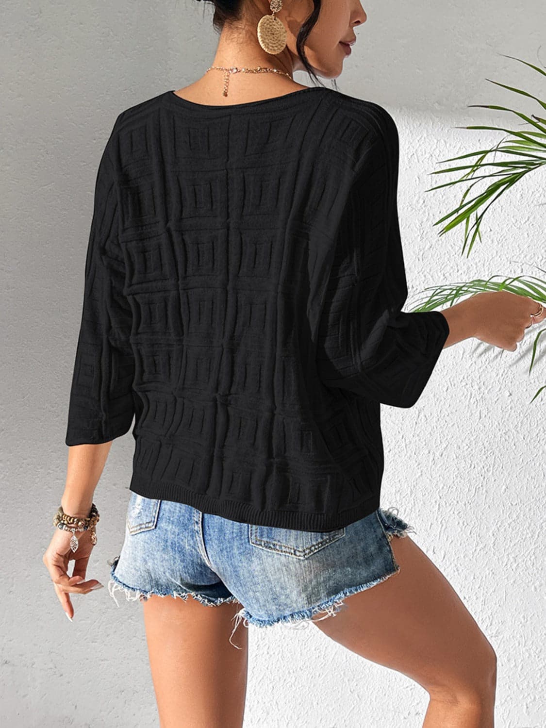 V-Neck Three-Quarter Sleeve Knit Top.