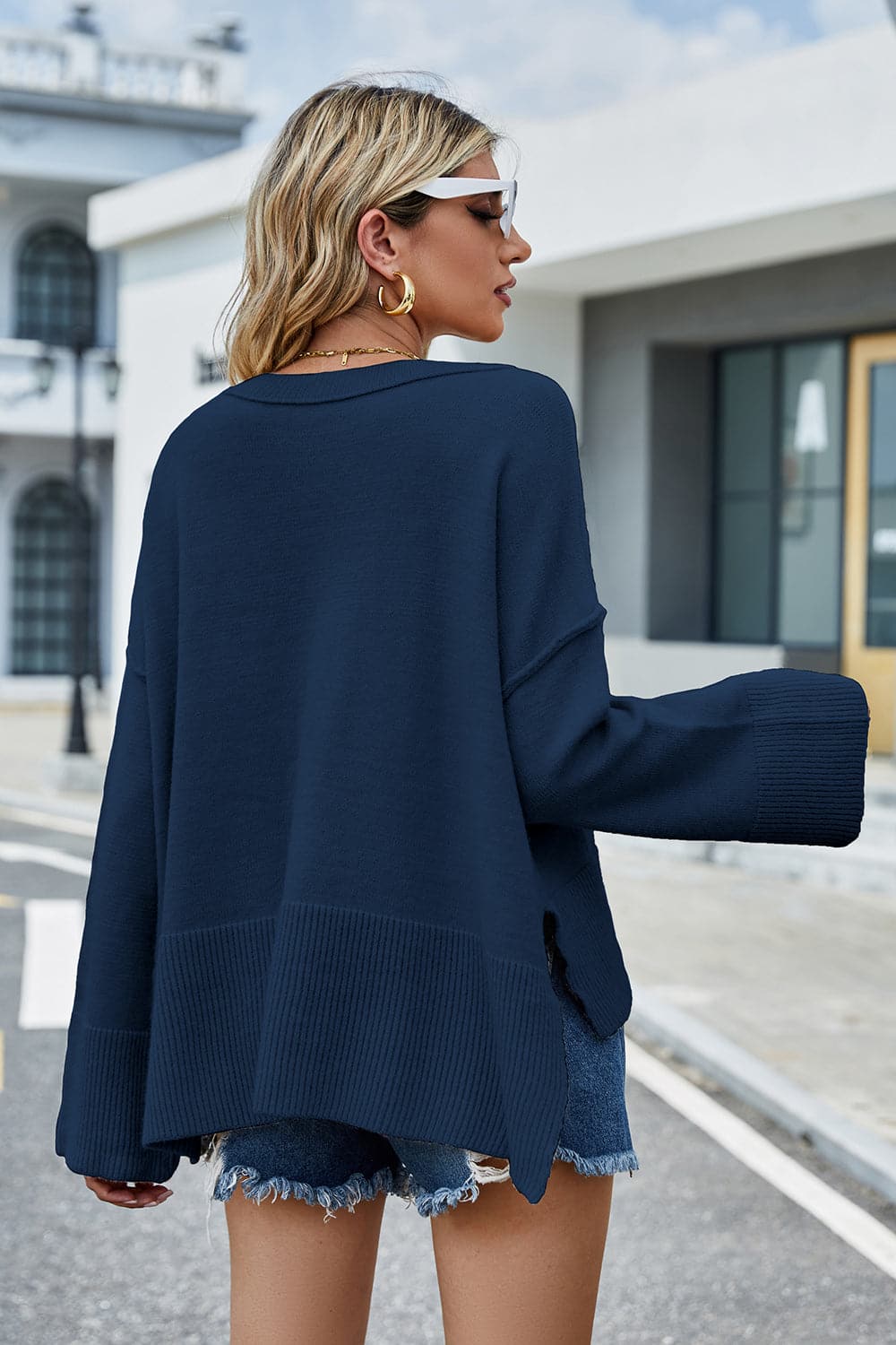 High-Low Slit Round Neck Long Sleeve Sweater.