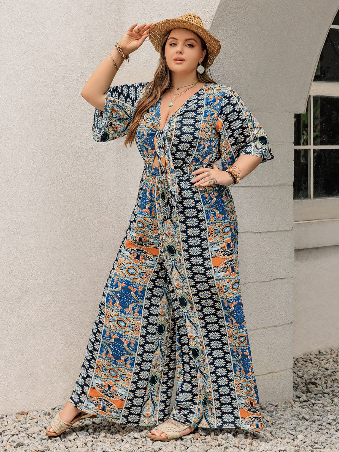 Plus Size Printed Half Sleeve Wide Leg Jumpsuit.