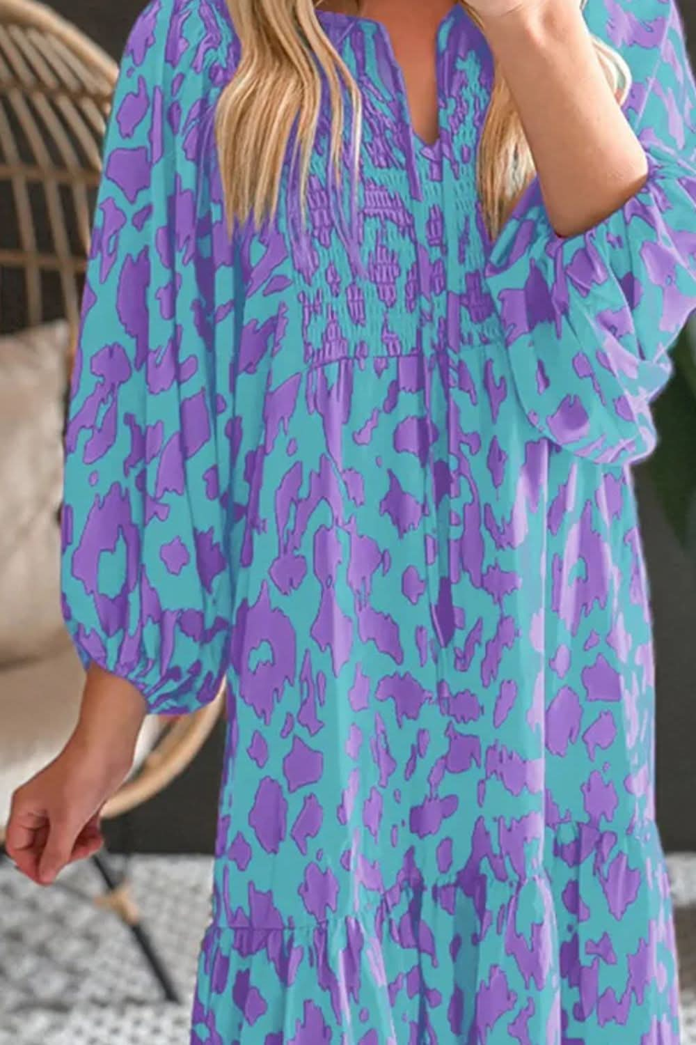 Floral smocked tie neck long sleeve dress