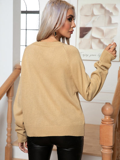 Cable-Knit Long Sleeve Sweater.