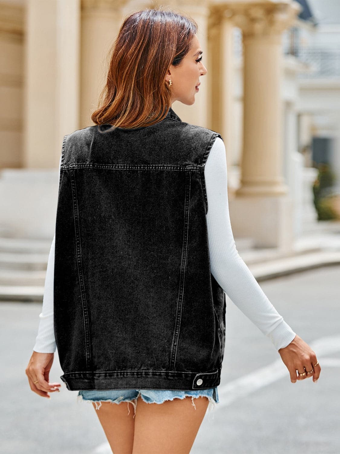 Pocketed Button Up Sleeveless Denim Jacket.