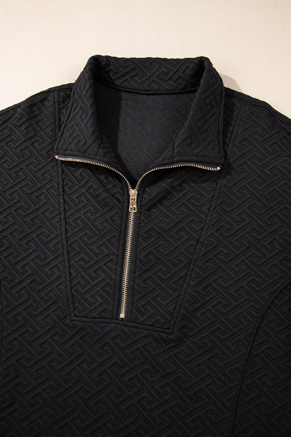 Textured black half-zip collared sweatshirt for effortless style