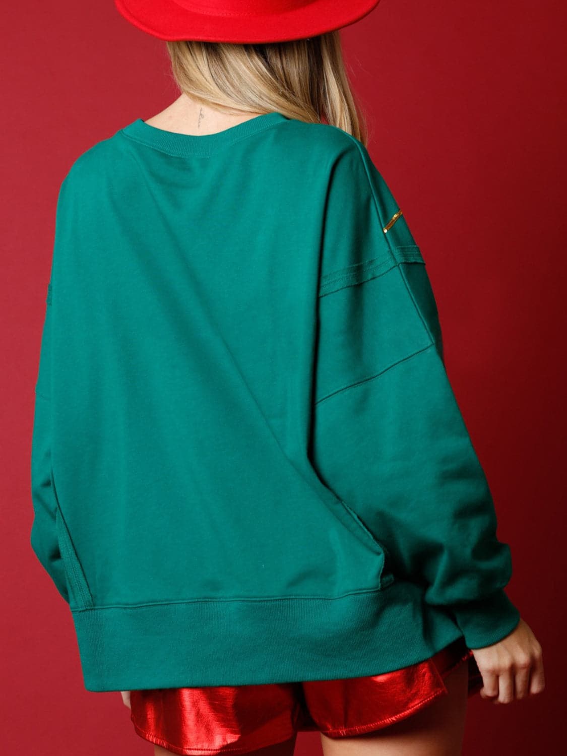 Slit Sequin Round Neck Sweatshirt.