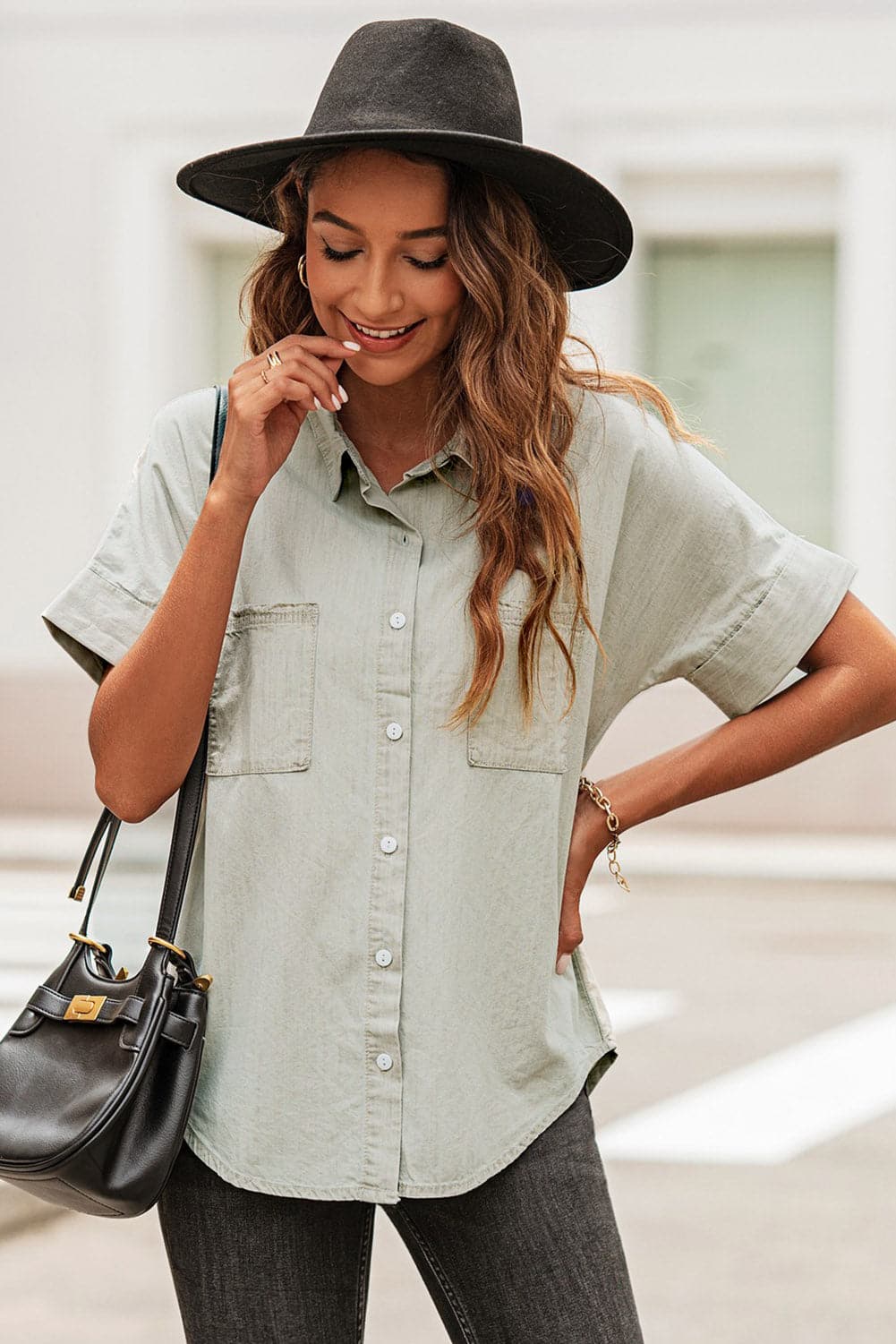 Button Front Collared Short Sleeve Shirt.