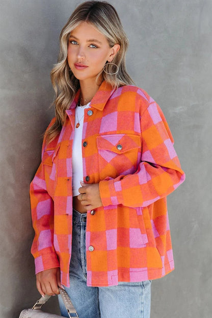 Orange plaid button-up jacket with chest pockets and turn-down collar