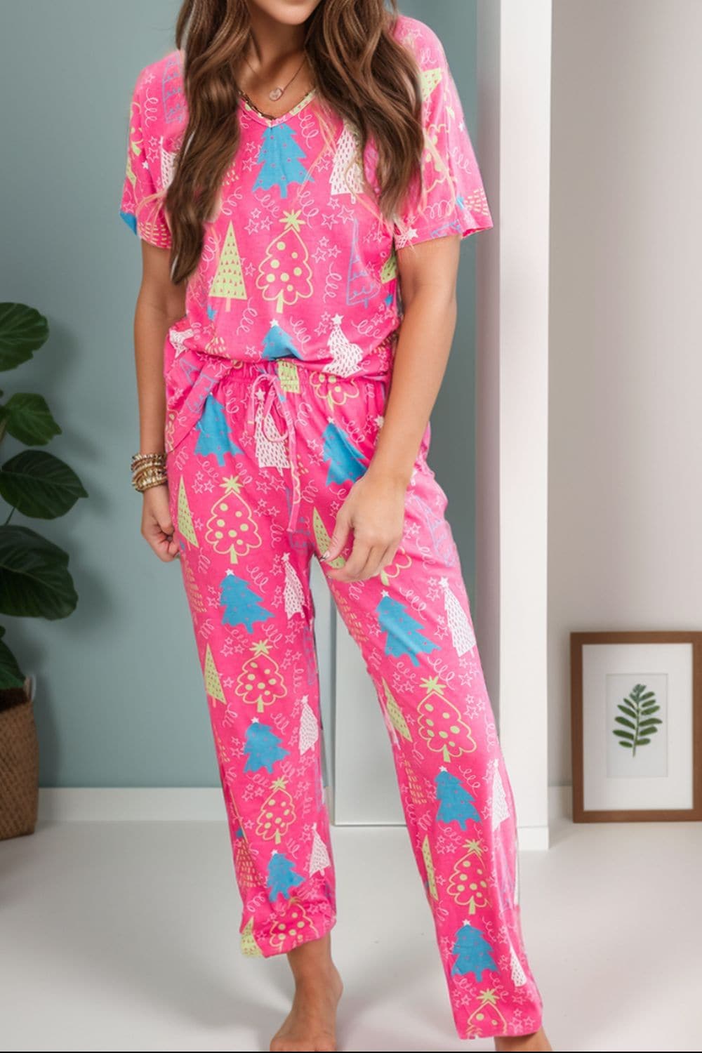 Printed V-Neck Short Sleeve Top and Pants Lounge SetFeatures: Drawstring
Number of pieces: Two-piece
Sheer: Opaque
Stretch: Slightly stretchy
Material composition: 95% polyester, 5% elastane
Care instructions: MachineLove Salve -Neck Short Sleeve TopLoungewear Sets