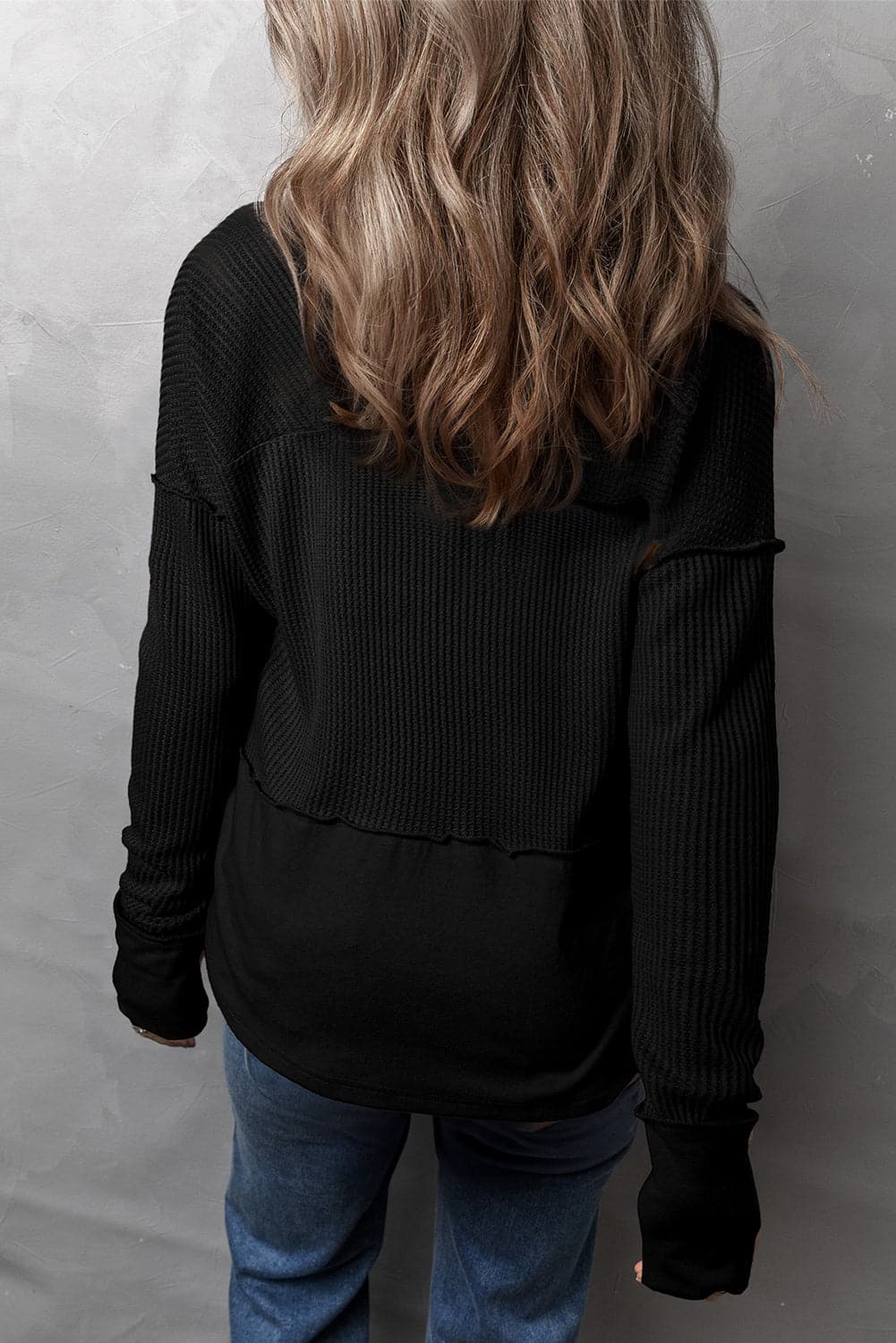 Waffle-Knit Exposed Seam Notched Long Sleeve Top.