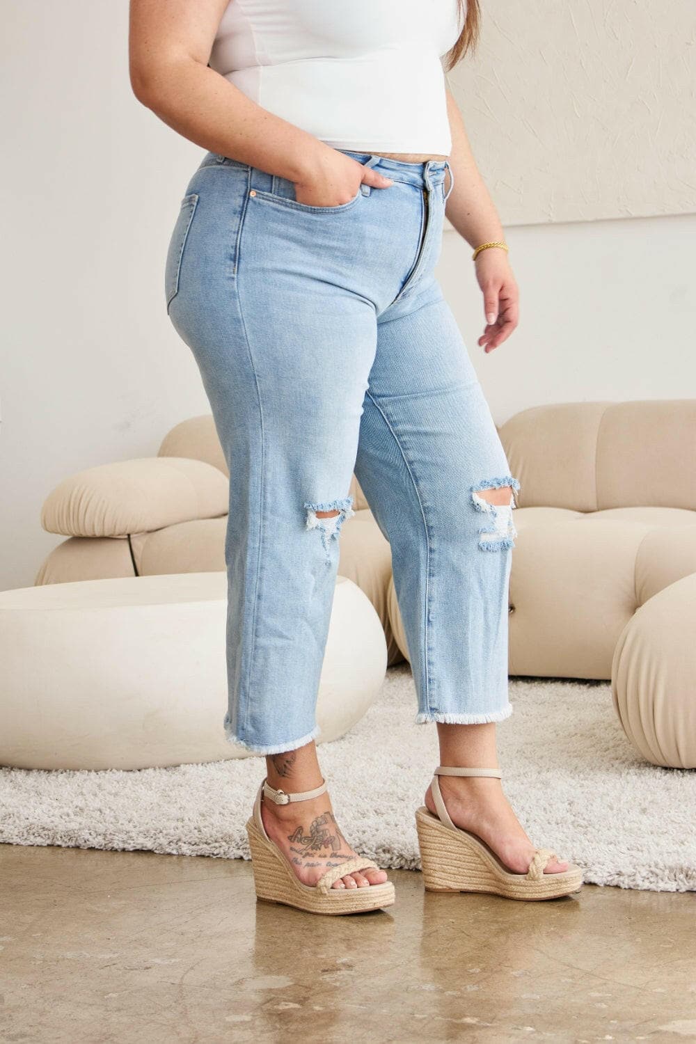 RFM Full Size Tummy Control High Waist Raw Hem Distressed Jeans.