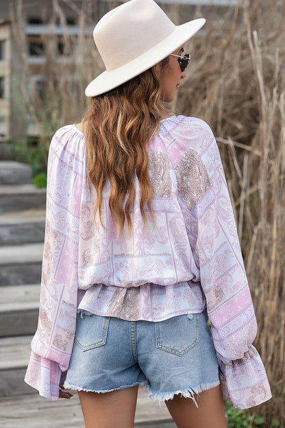 Printed Tie Neck Flounce Sleeve Blouse.