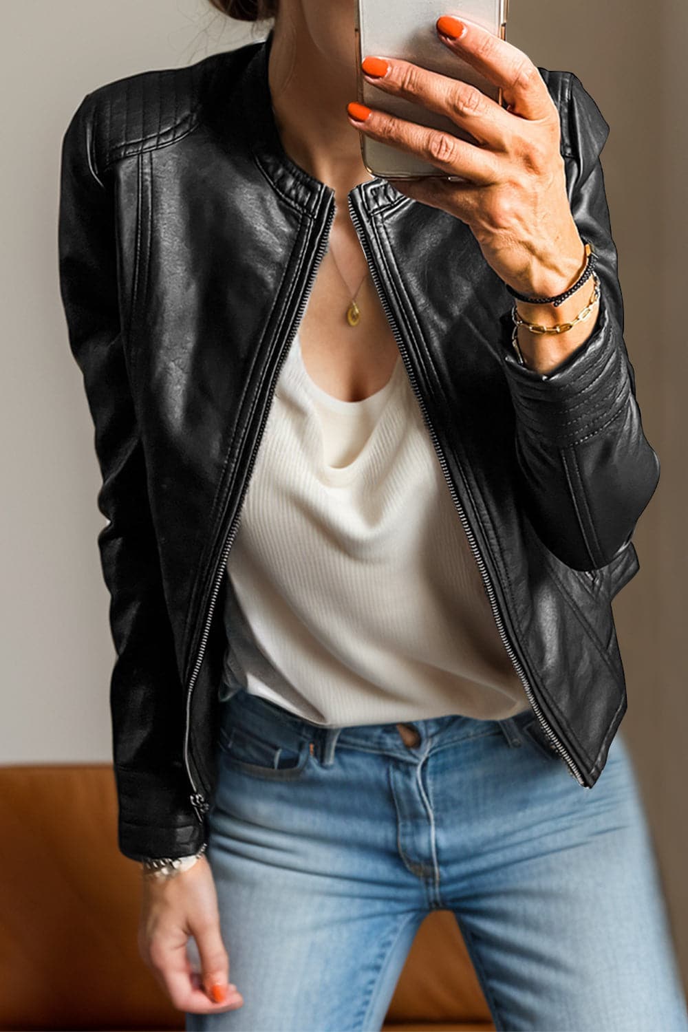 Stylish PU leather round neck jacket with long sleeves and pockets