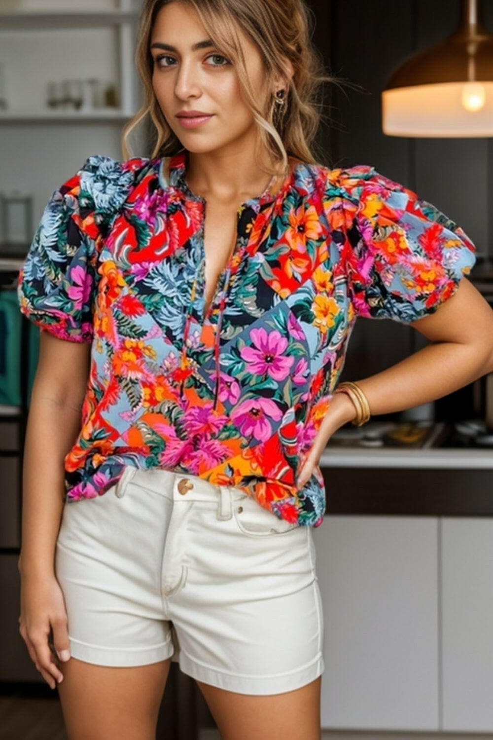 Ruffled Printed Tie Neck Short Sleeve Blouse.