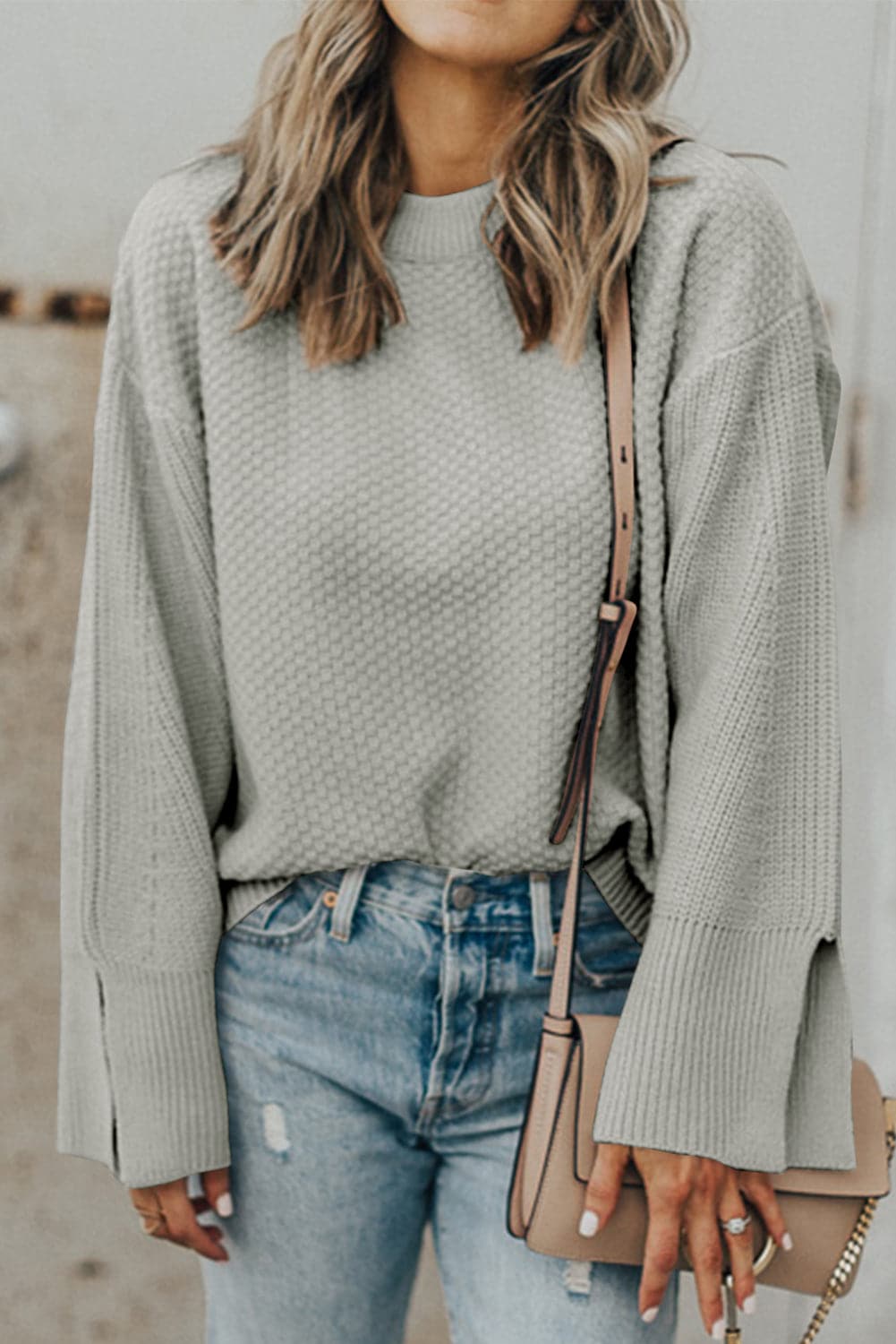 Chic textured long sleeve sweater with stylish slit detail