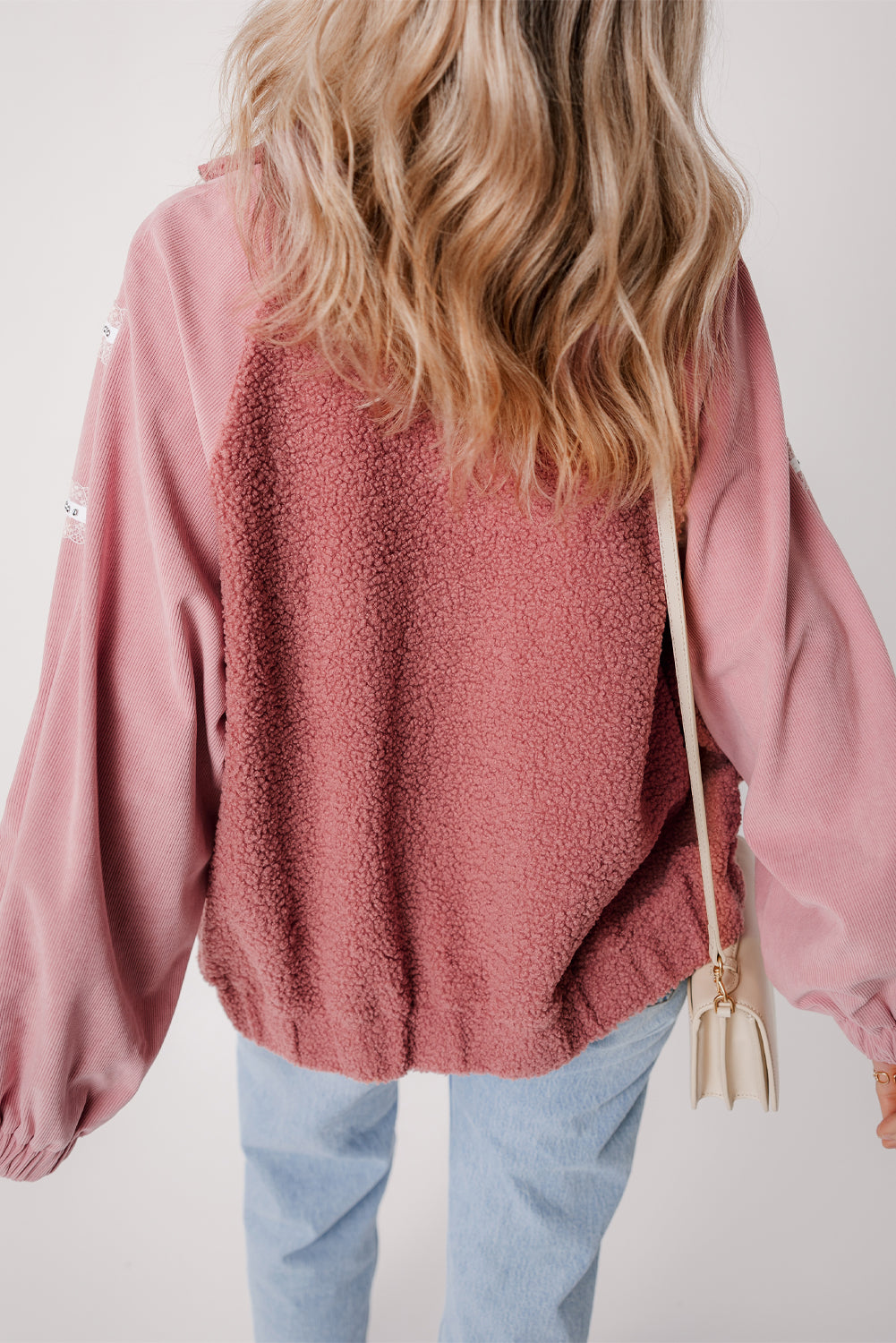 Cozy rose pink sherpa jacket with lace detailing and zip-up style