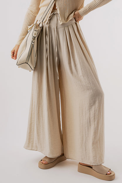 Beige high-waisted wide-leg trousers