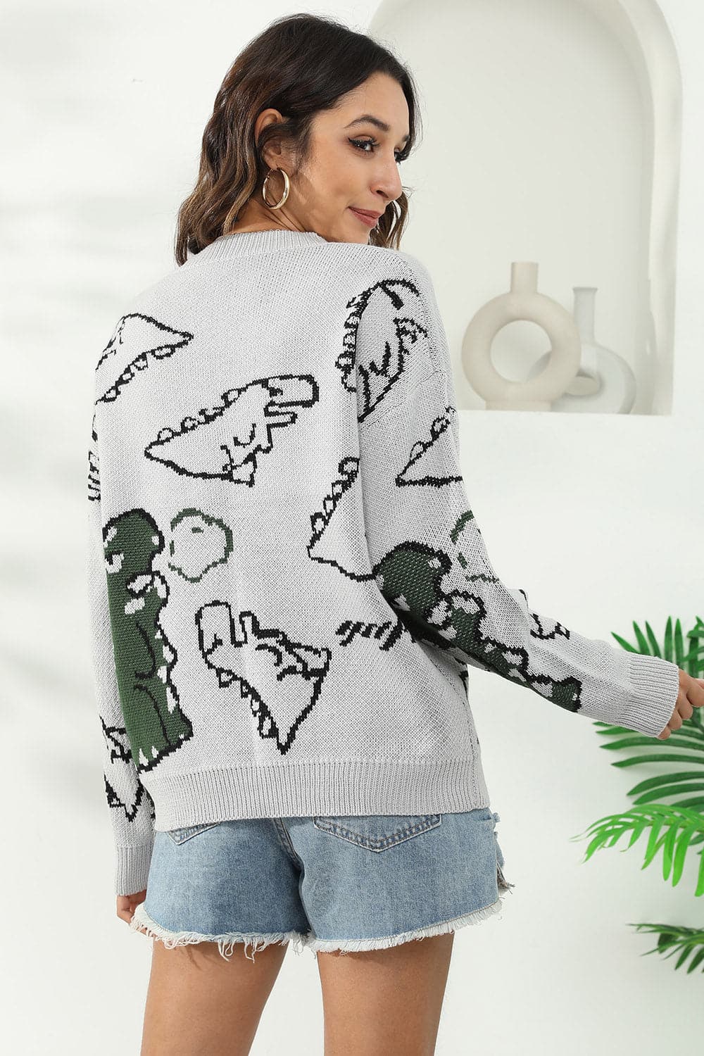 Dinosaur Print Pullover Sweater.