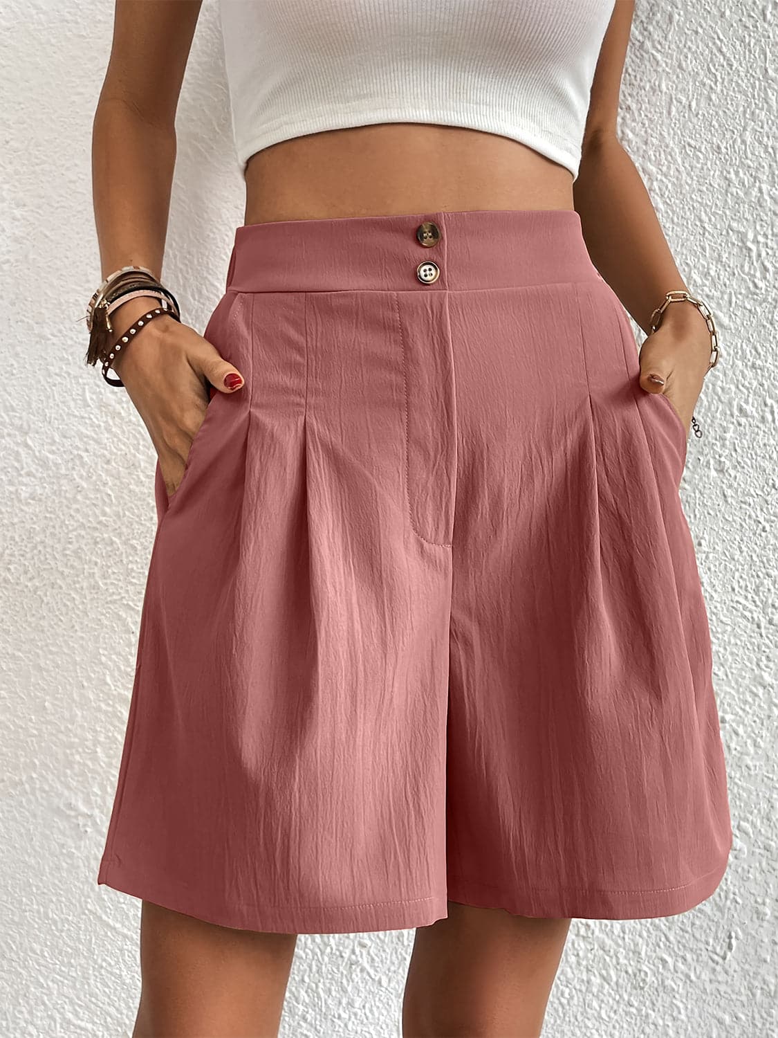 Pocketed Half Elastic Waist Shorts.