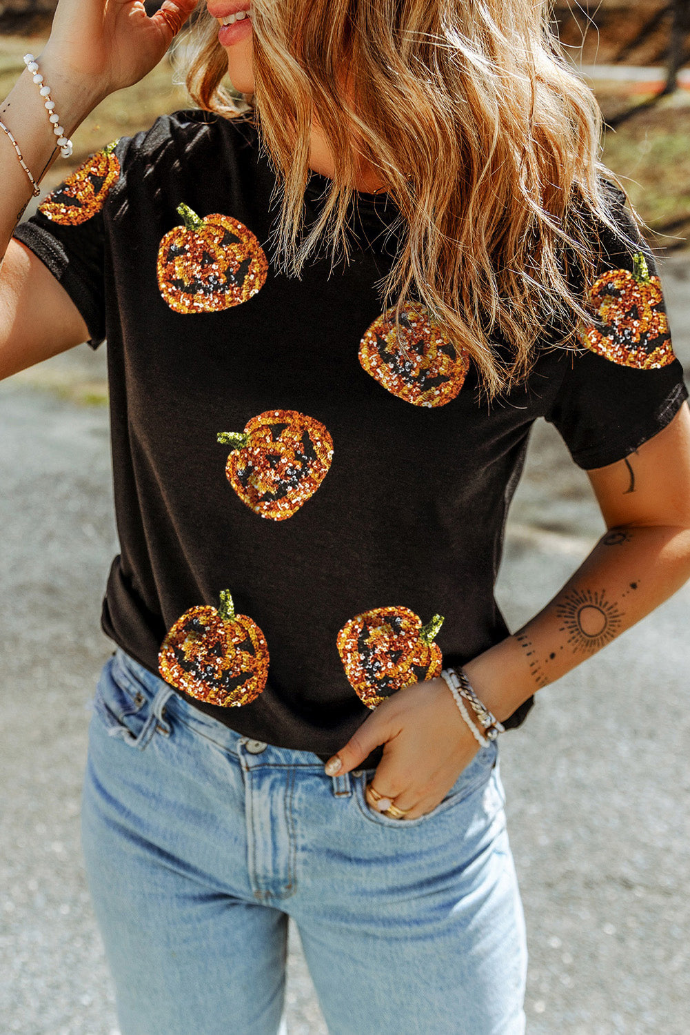 Sparkling pumpkin face Halloween tee for festive fun