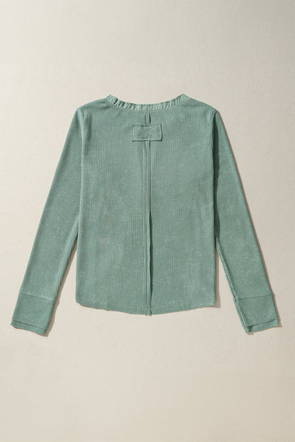 Trendy smoke green acid wash waffle knit long sleeve top with buttoned neckline