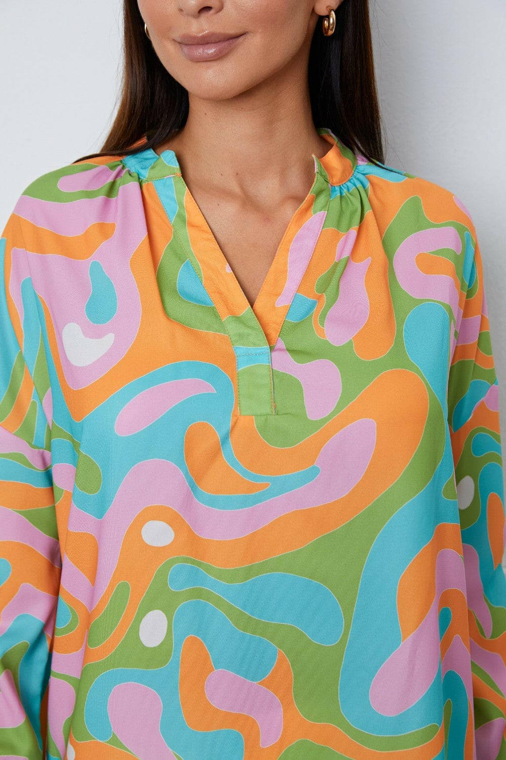 Printed Notched Long Sleeve Blouse.