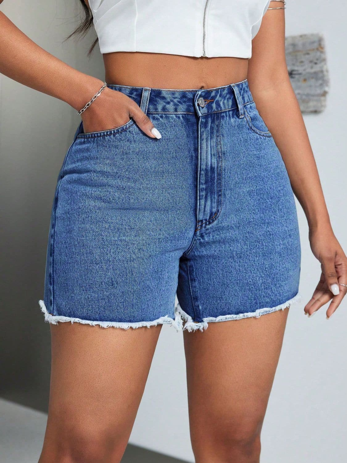 Raw Hem High Waist Denim Shorts.