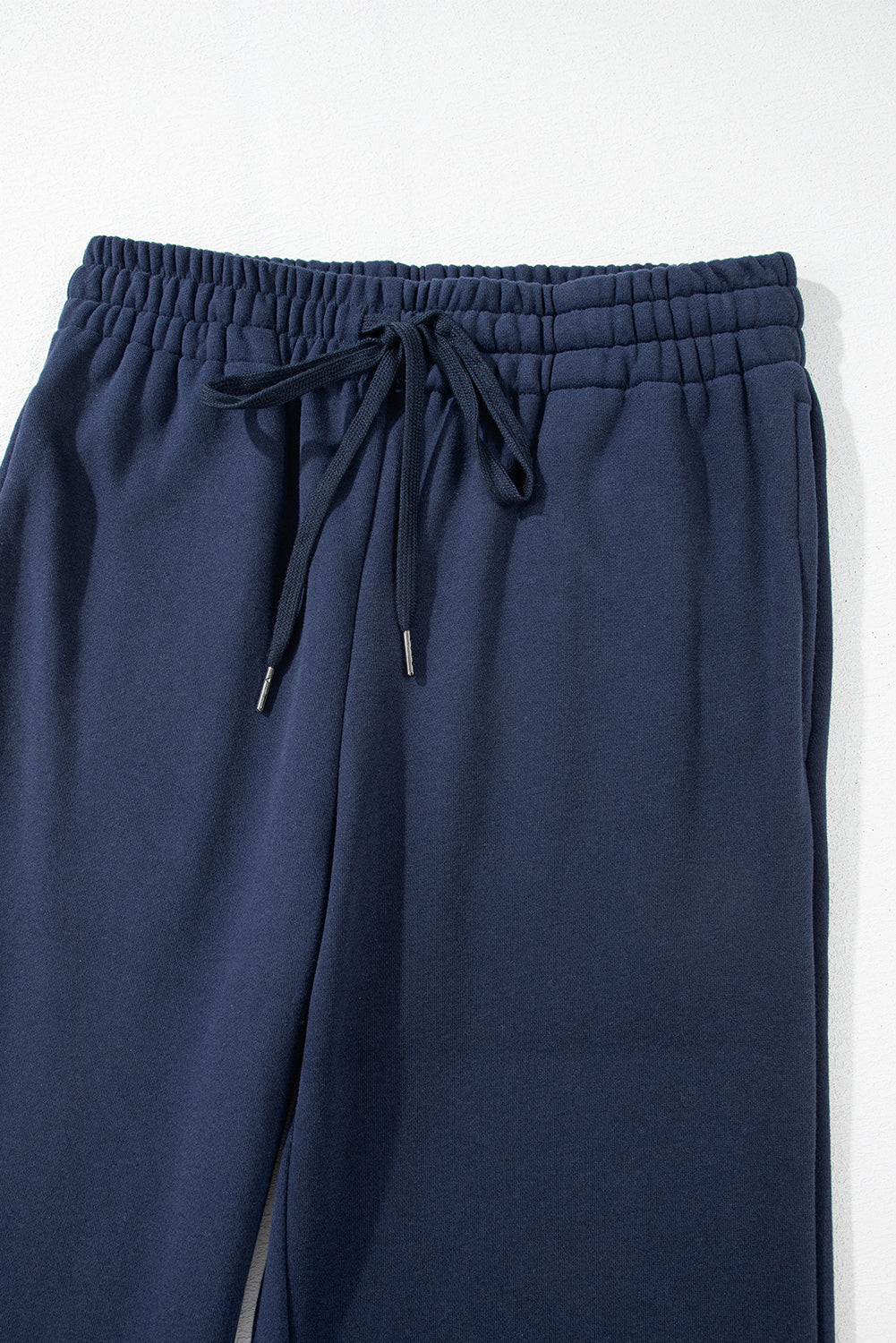 Navy blue fleece pants with drawstring