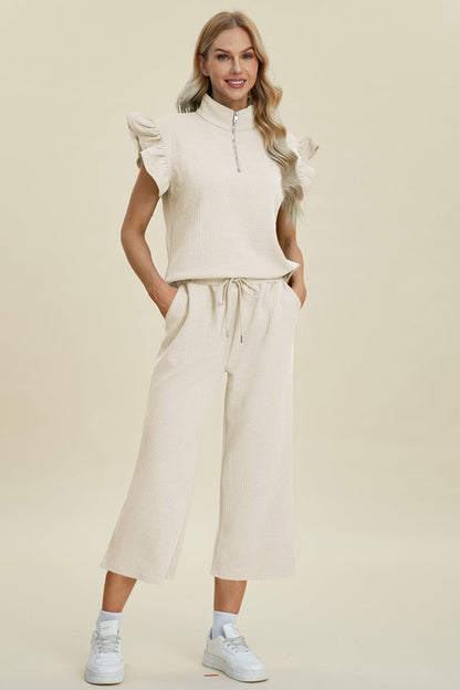 Double Take Full Size Texture Ruffle Short Sleeve Top and Wide Leg Pants Set.