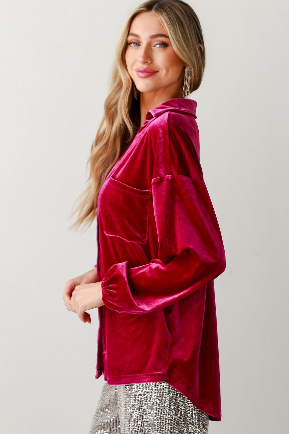 Chic pitaya pink velvet shirt with button details and V-neckline