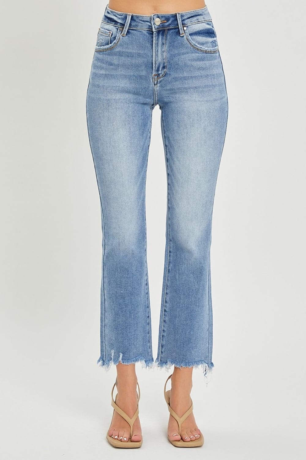 RISEN Full Size Frayed Hem Cropped Straight JeansTrendy and Stylish Design

Frayed hem cropped straight jeans are a trendy and stylish choice for a casual and chic look. The frayed hem adds a touch of edginess and Love Salve RISEN Full Size Frayed Hem Cropped Straight JeansJeans