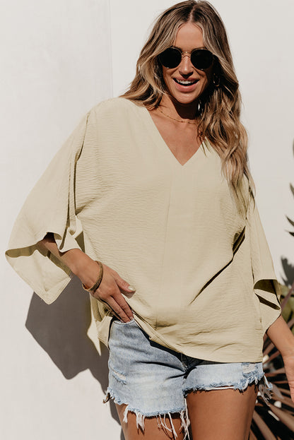 Parchment V neck crinkled blouse with wide sleeves