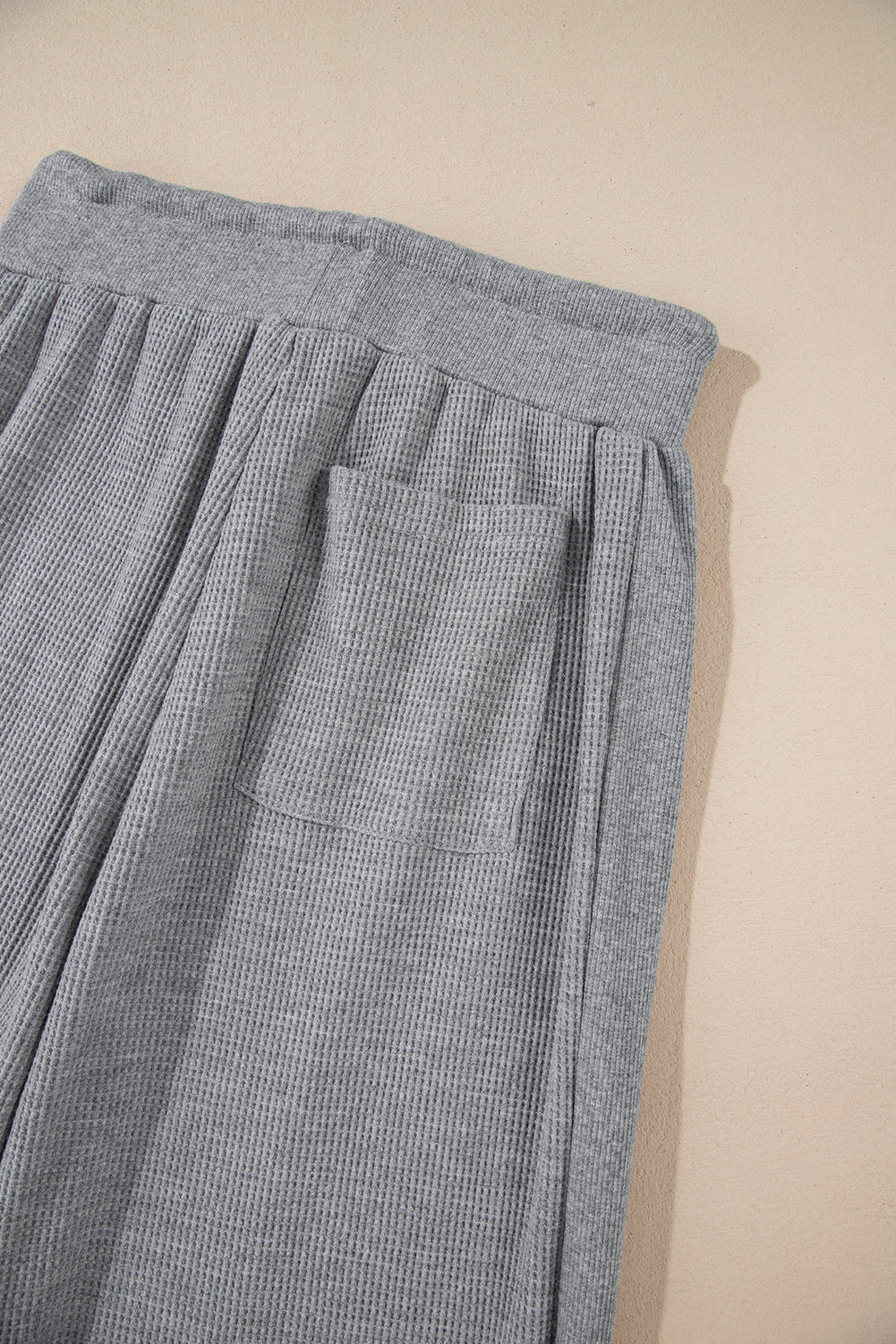 Cozy gray high-waist wide-leg pants with drawstring detail