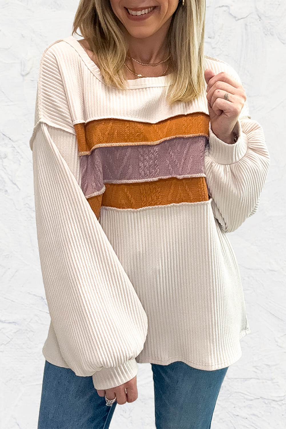 Chic white knit patchwork top with drop sleeves and exposed seams