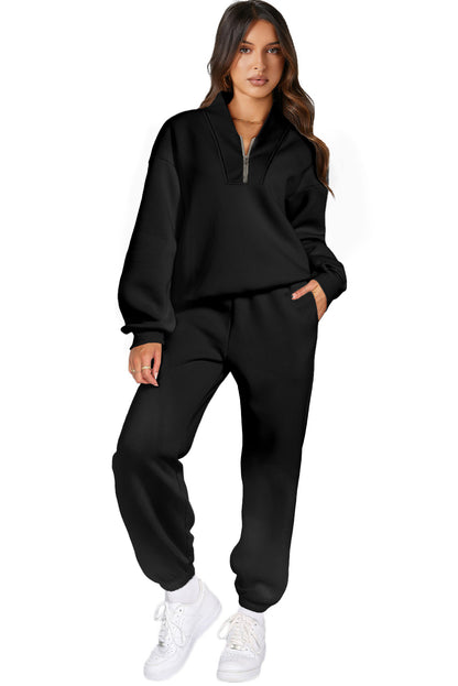 Chic black half zip tracksuit with ribbed edges for ultimate comfort