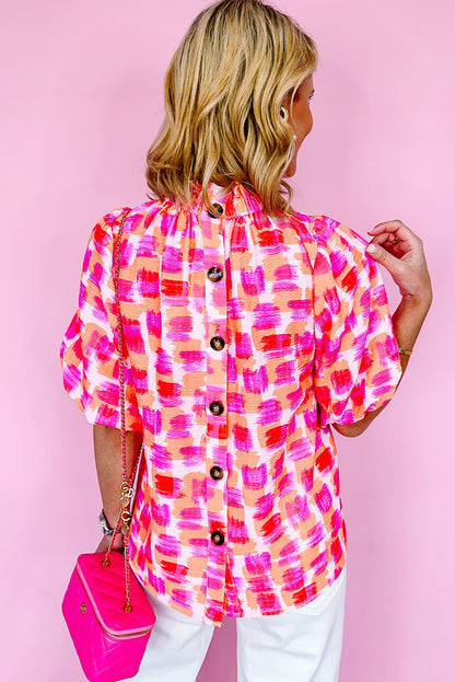 Chic pink abstract print high neck blouse with button back detail