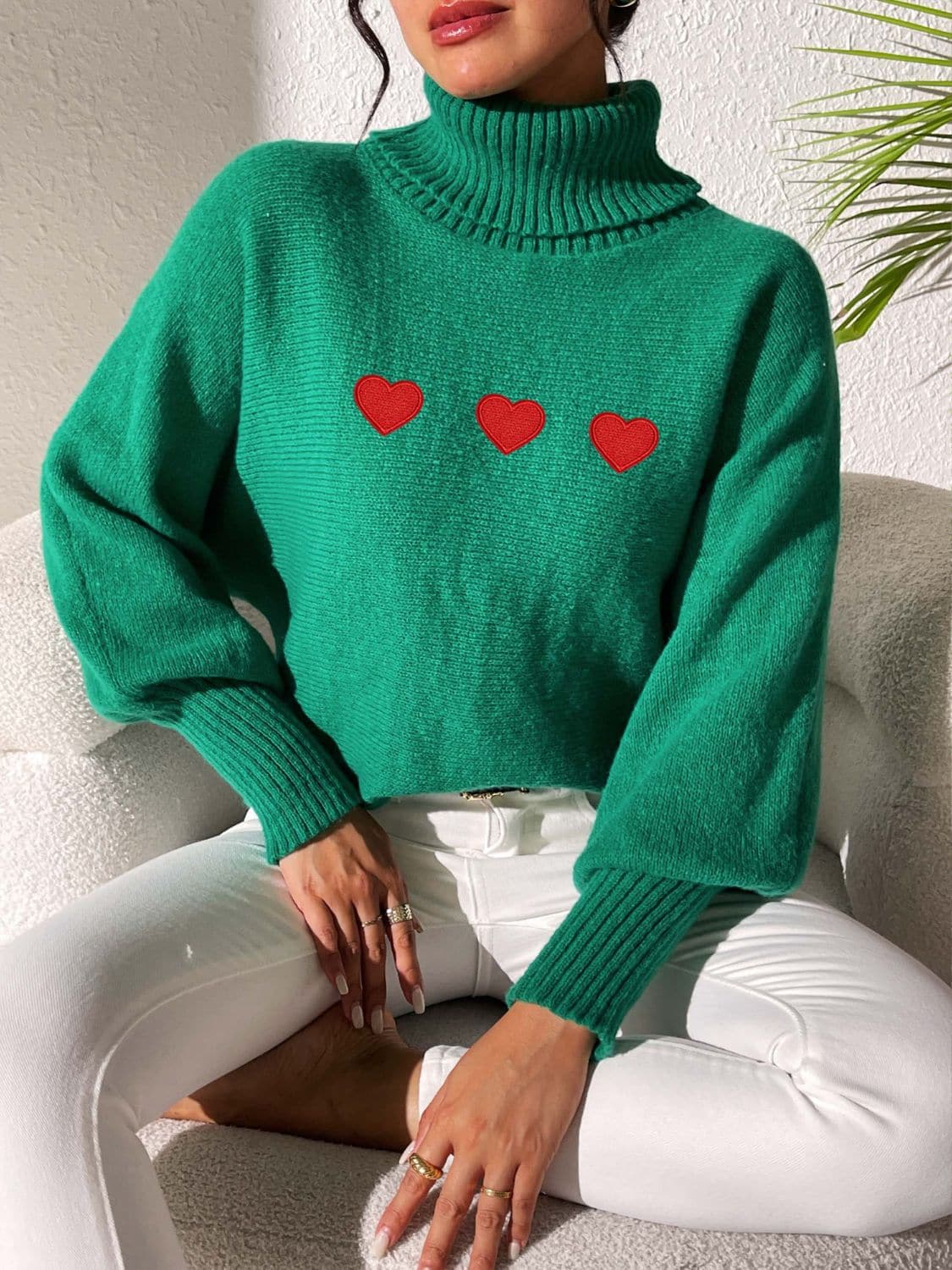 Charming heart-print turtleneck sweater