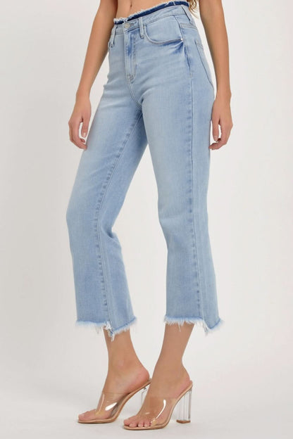 Edgy high rise cropped jeans with raw hem detail