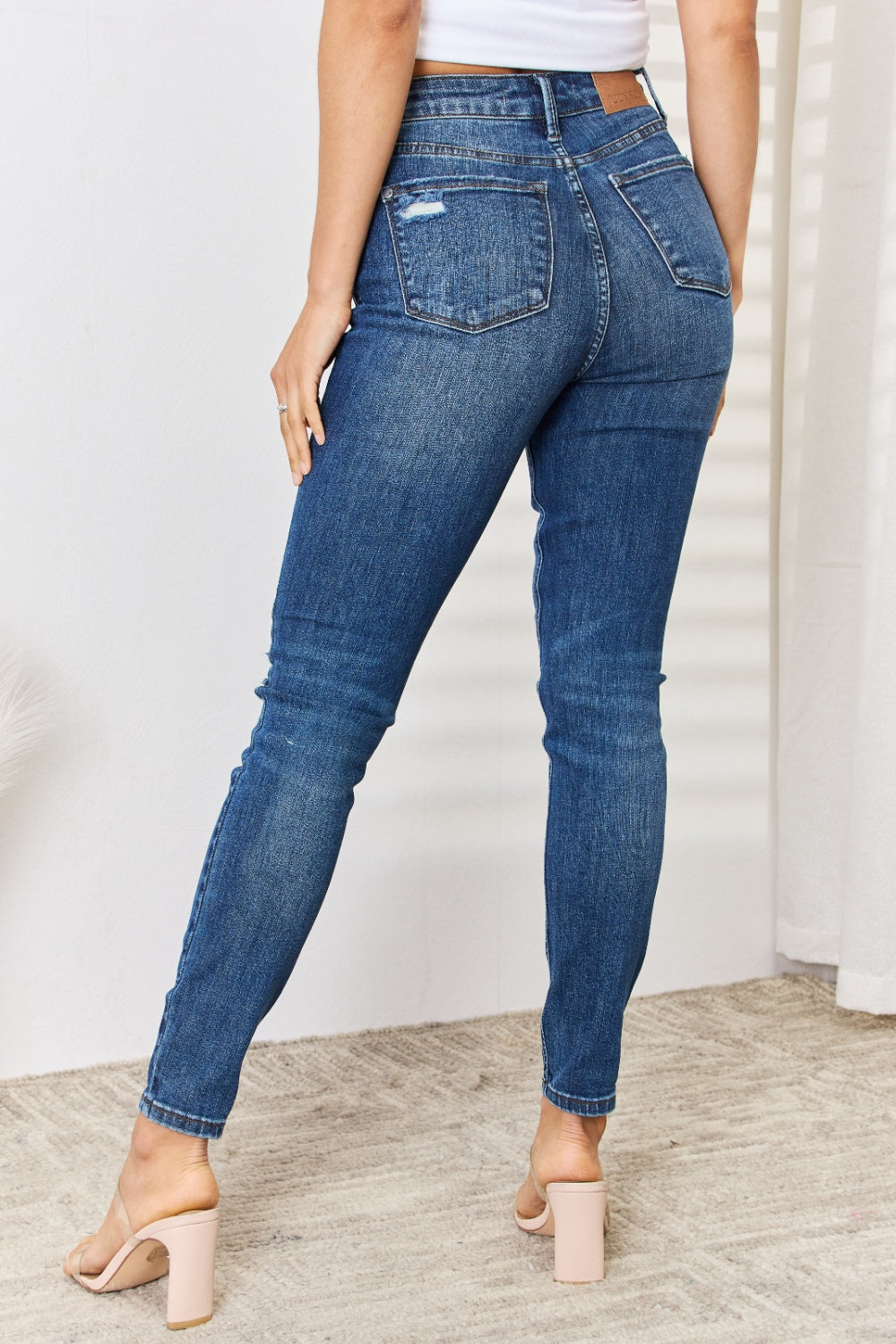 Judy Blue Full Size Mid Waist Distressed Slim Jeans Coco’s Tee Boutique
