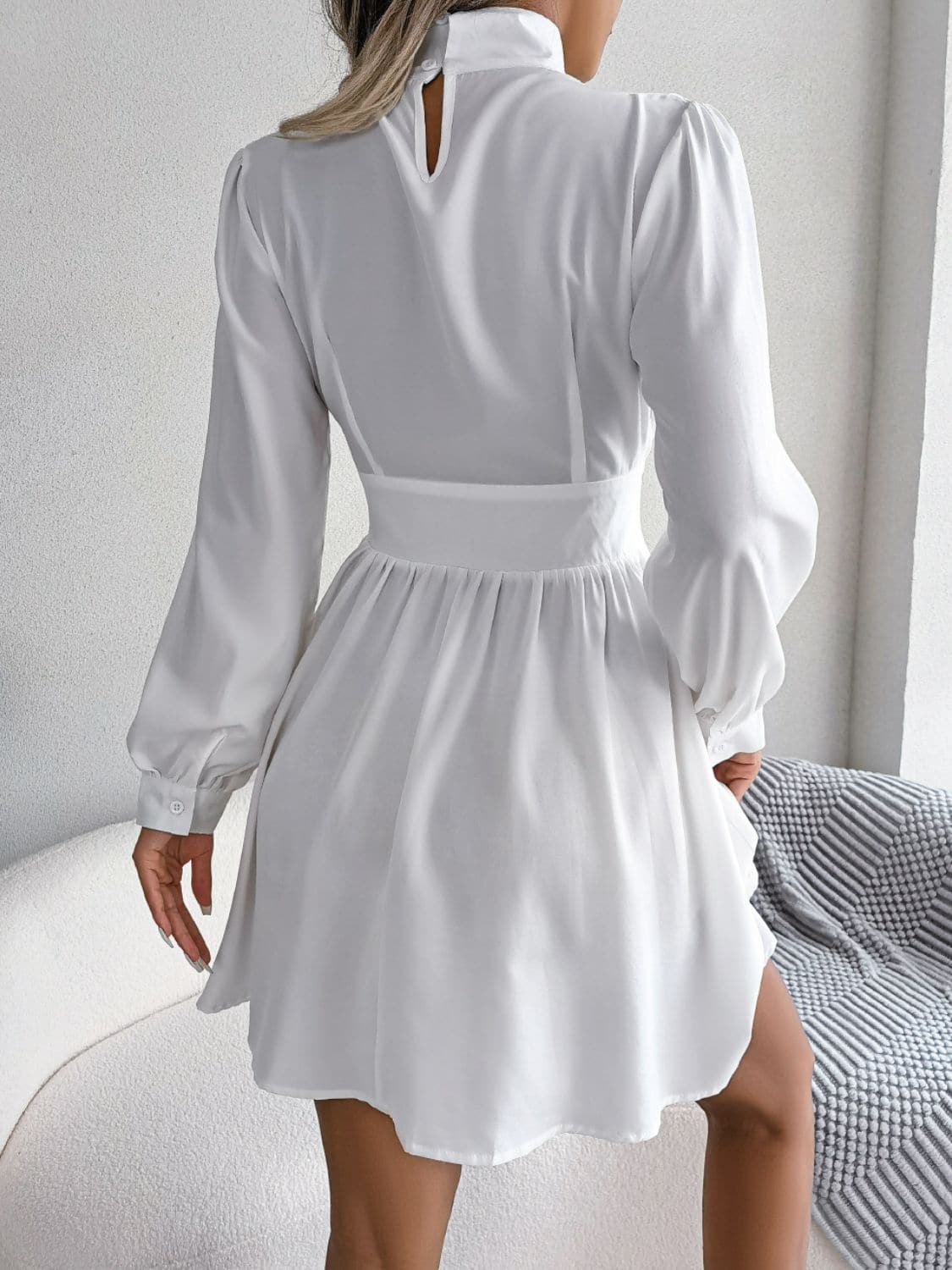 Cutout Turtleneck A-Line Mini Dress.