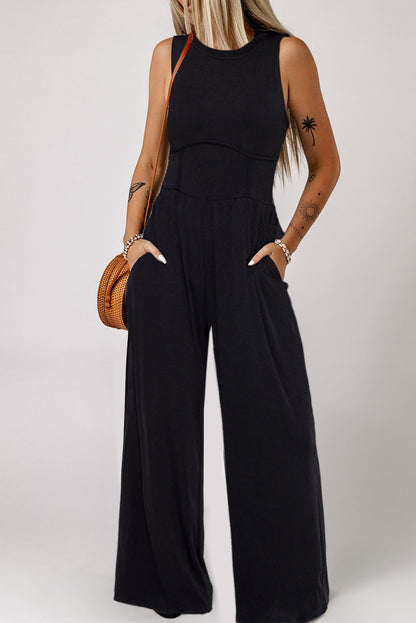 Chic black sleeveless jumpsuit with cinched waist and wide legs