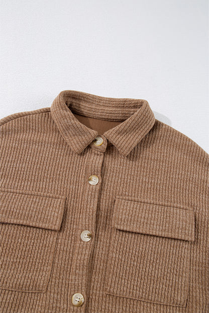 Dark khaki corduroy shacket with button closure and chest pockets